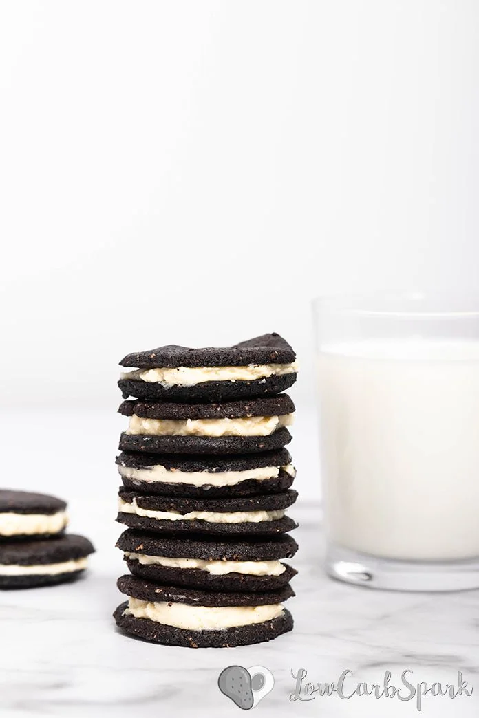 These keto oreo cookies are just like the original, but only 2g net carbs each and grain-free. Imagine a crunchy chocolate cookie sandwich with a delicious vanilla cream filling.