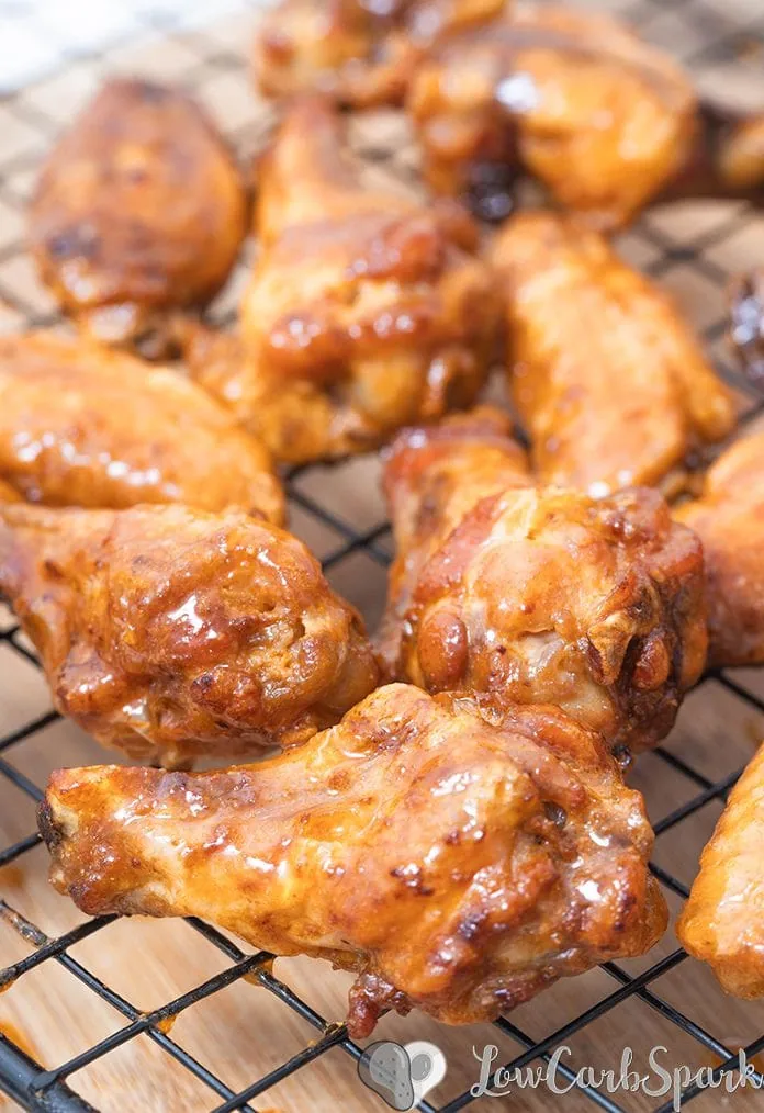 These Air Fryer Chicken Wings are super crispy, and the meat is juicy. Cooking Chicken Wings in an Air Fryer instead of deep frying makes them a healthy choice. This extremely popular recipe is ready  30 minutes and super easy to make! Toss them in a delicious low carb Buffalo sauce, and your meal is ready.