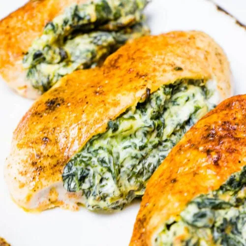 Delicious chicken breast stuffed with creamy and cheesy spinach, cream cheese filling baked in the oven is super juicy and tasty. This meal is family-friendly and super quick to make.