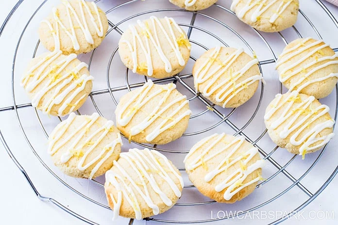 These sugar-free lemon cookies are extremely soft on the inside, crispy on the outside and packed with lemon flavor. Drizzle them with my two ingredients, keto lemon glaze, and everyone will love them.   