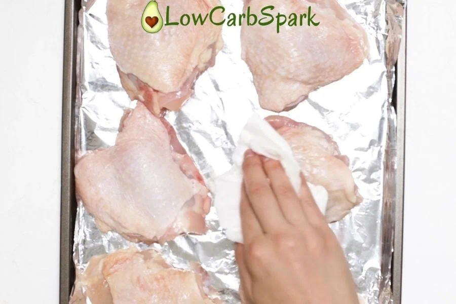 pat dry the chicken thighs