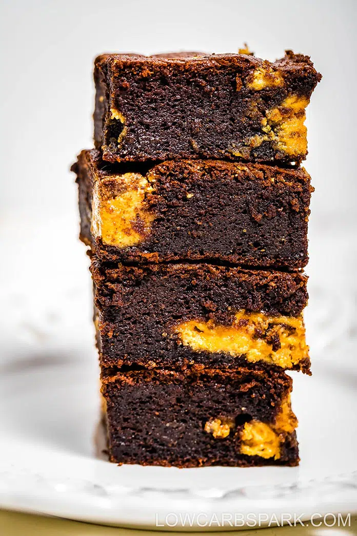 Fudgy homemade keto peanut butter brownies recipe that are easy to  make simple, rich, moist, soft! Only 2g net carbs per square. Recipe on lowcarbspark.com