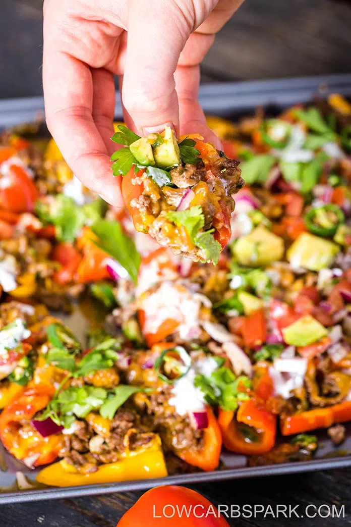 Low Carb Nachos with peppers is perfect for your next gathering. So easy to make, this effortless recipe is ready in under 25 minutes and successfully replaces the high carbs original loaded nachos. 