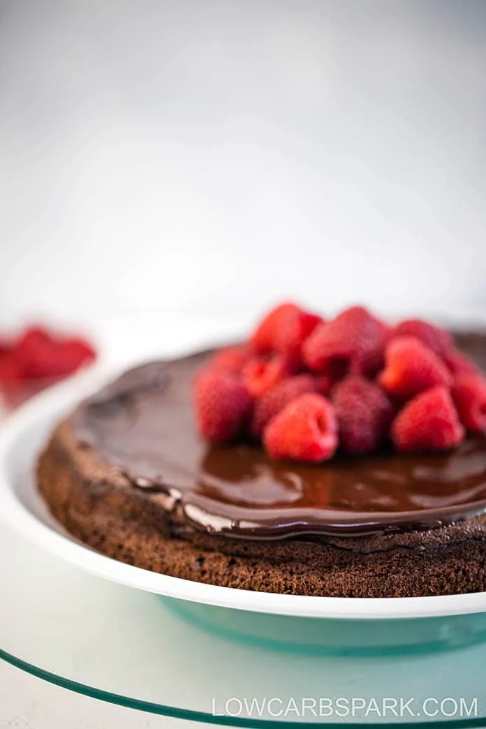 This delicious gluten-free flourless chocolate cake recipe is naturally keto and sugar-free. Make it for any special occasion when you want a sugar-free fudgy flourless cake. 