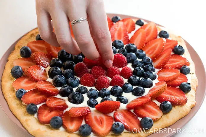 decorate keto pizza with fruits