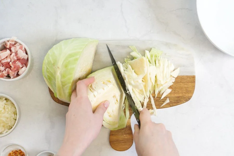 chop cabbage on a board