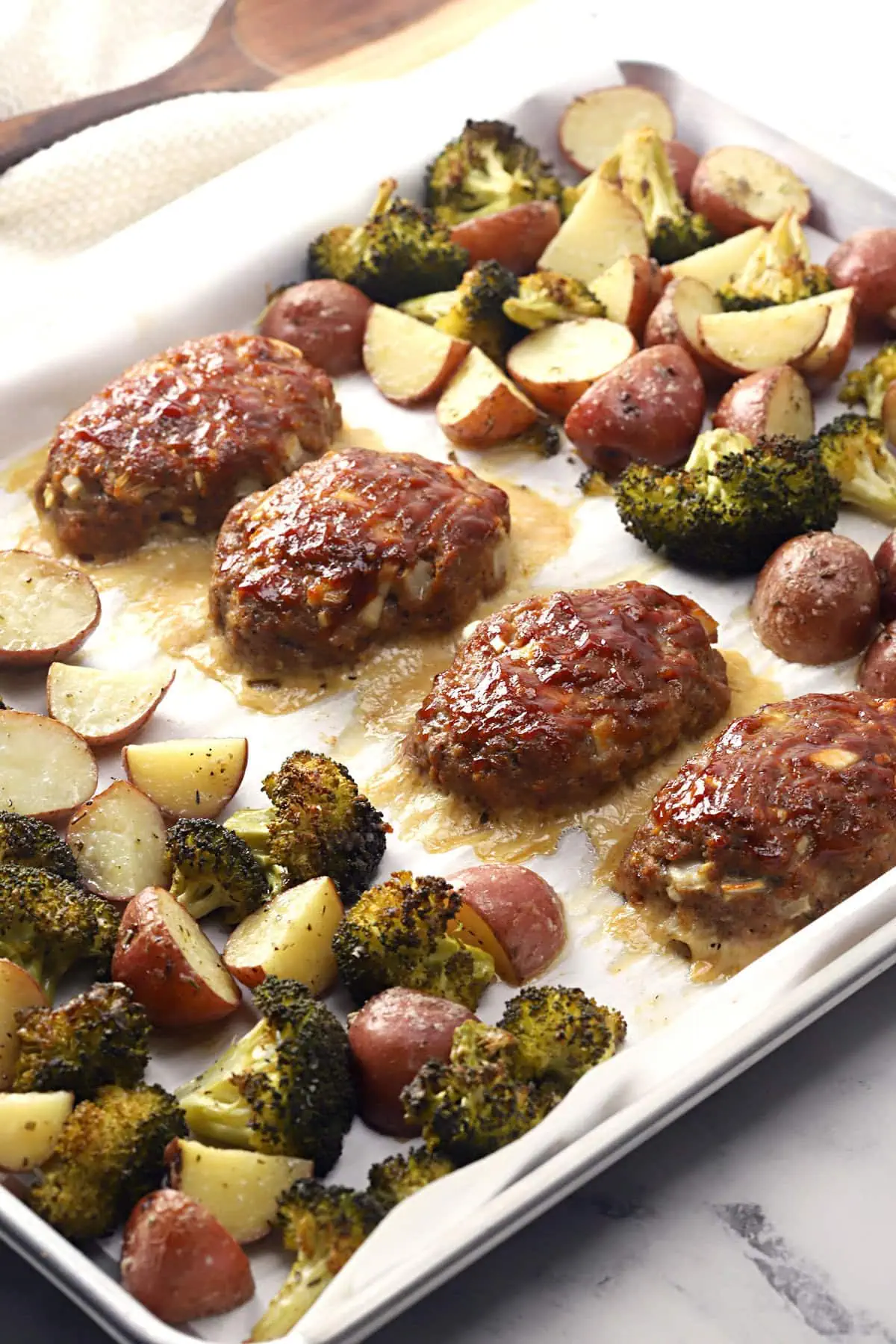 sheet pan with mini meatloaves veggies 1