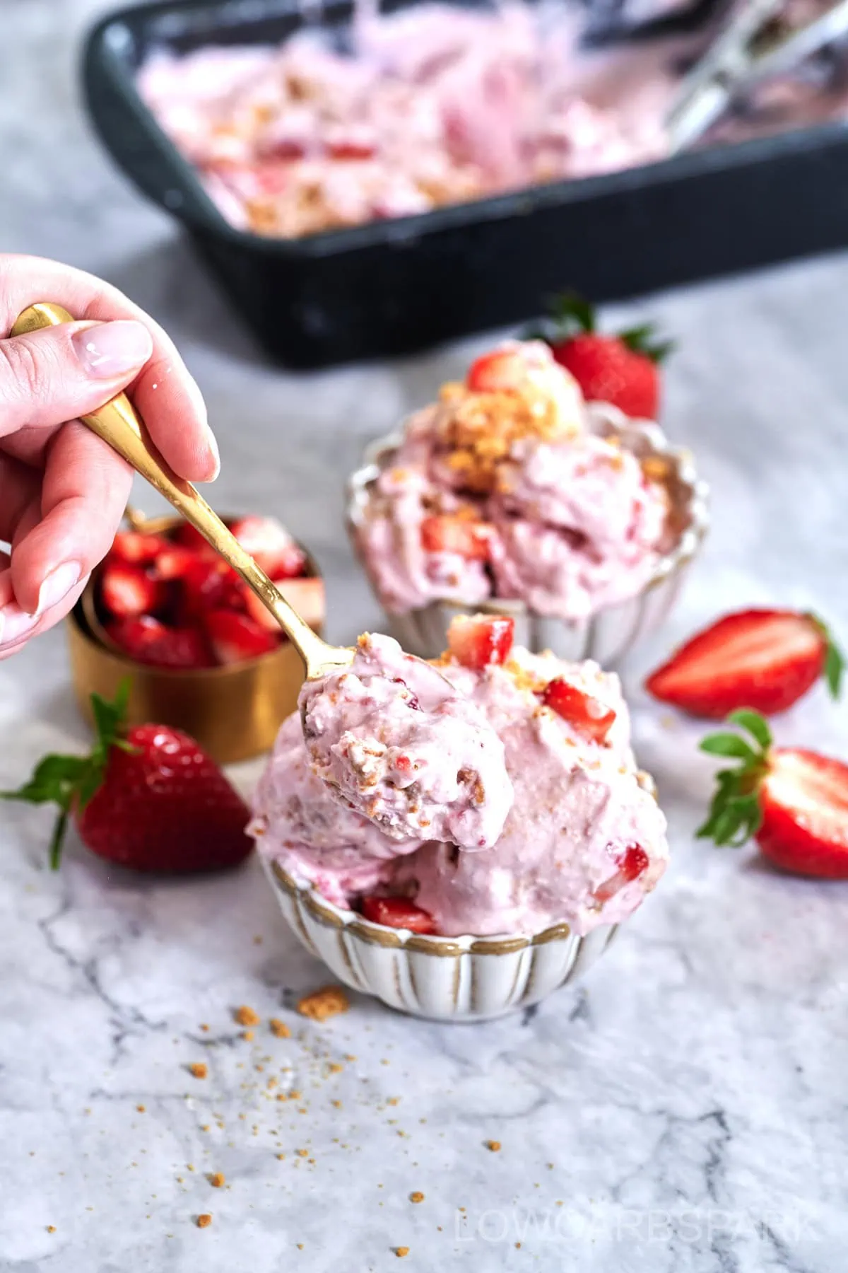 Cottage Cheese Strawberry Ice Cream in a golden spoon